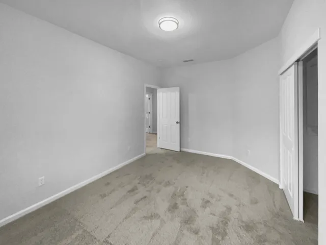 an empty room with an entryway