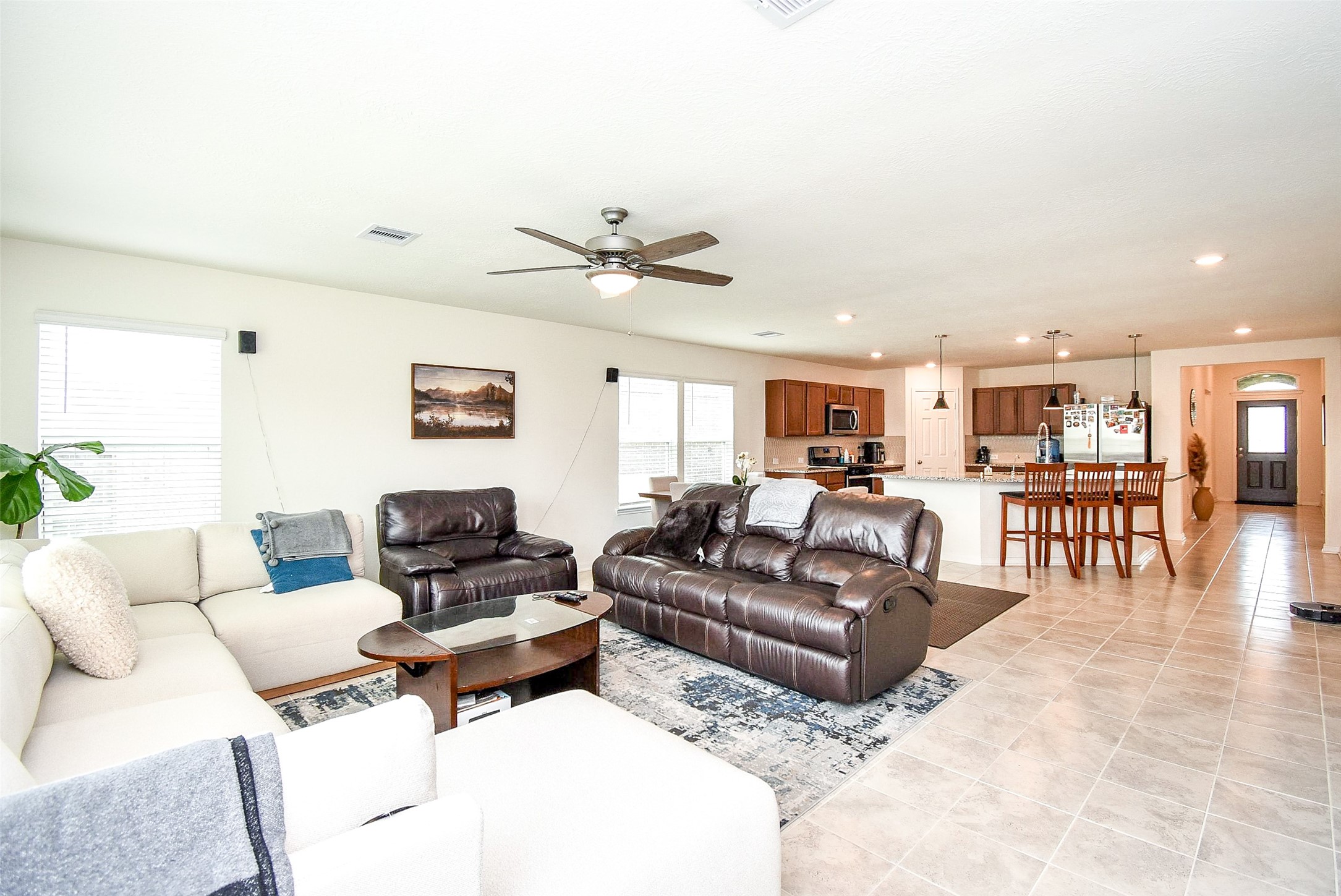 5912 Whitewing Road Rosenberg, TX 77469 - Photo 10 of 25 a living room with furniture and wooden floor