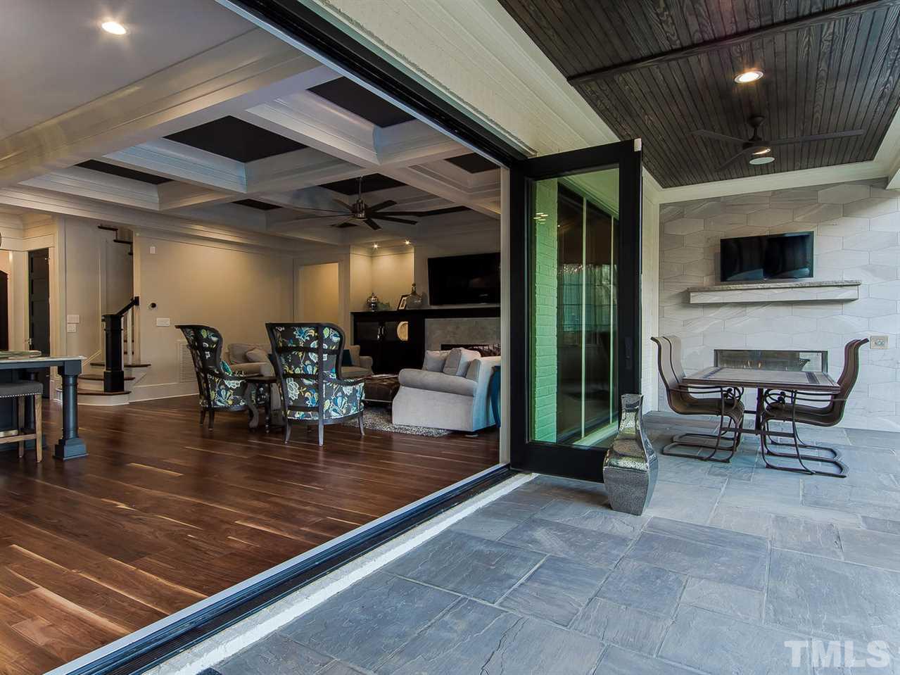 3210 Cobblestone Court Raleigh, NC 27607 - Photo 13 of 23 to your outdoor entertaining with gas fireplace