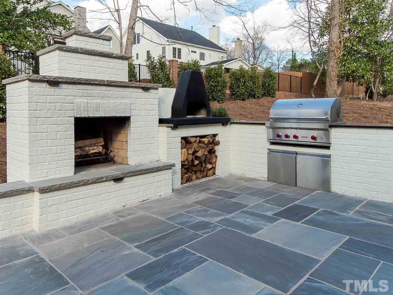 3210 Cobblestone Court Raleigh, NC 27607 - Photo 14 of 23 Slate Patio, Wood Burning Fireplace, Gas Grill and Pizza Oven