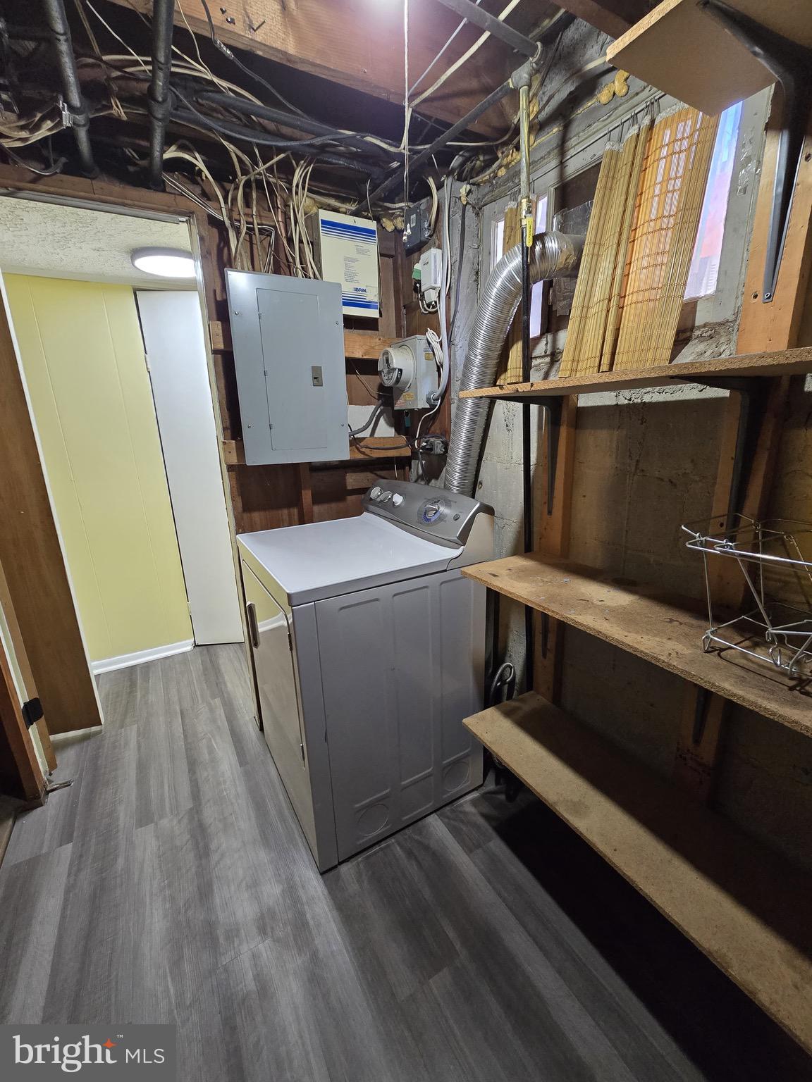 6105 Frederick Road Catonsville, MD 21228 - Photo 38 of 38 a room with wooden floor and furniture