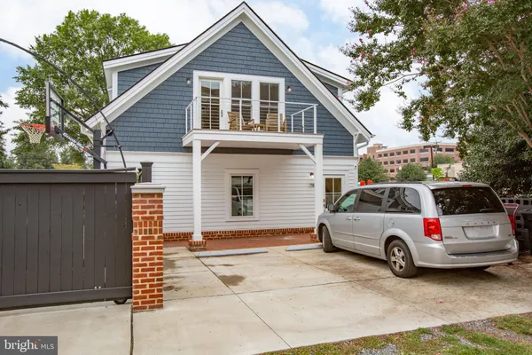 a car parked in front of a house