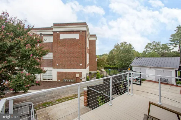 a view of a terrace with chairs