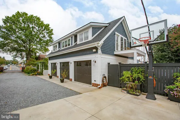a view of a house with a yard and plants