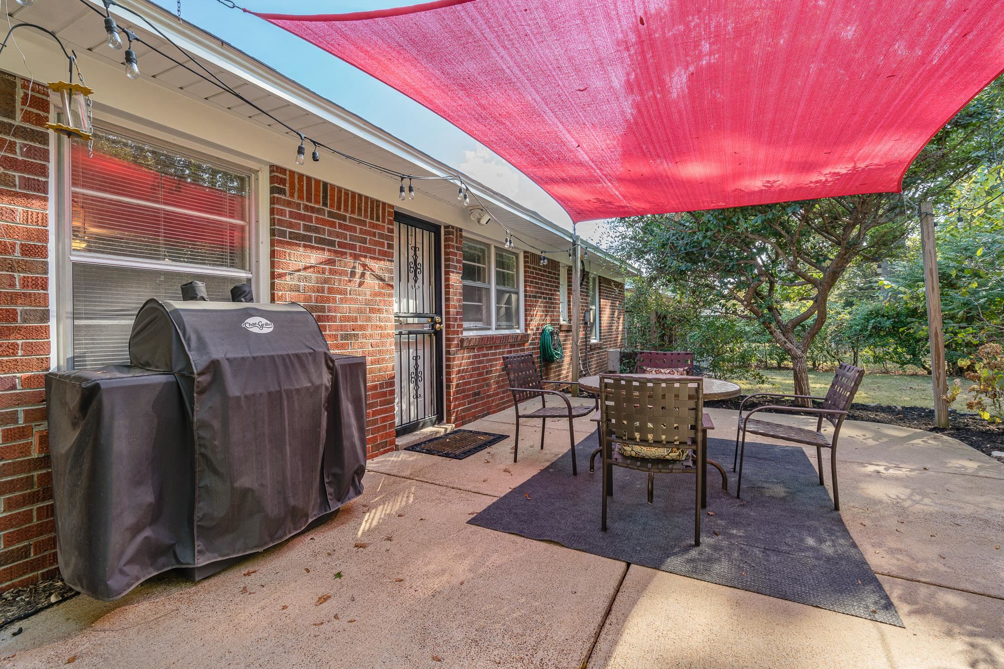 1607 Welsh Road Memphis, TN 38117 - Photo 16 of 21 a view of a patio with table and chairs and potted plants
