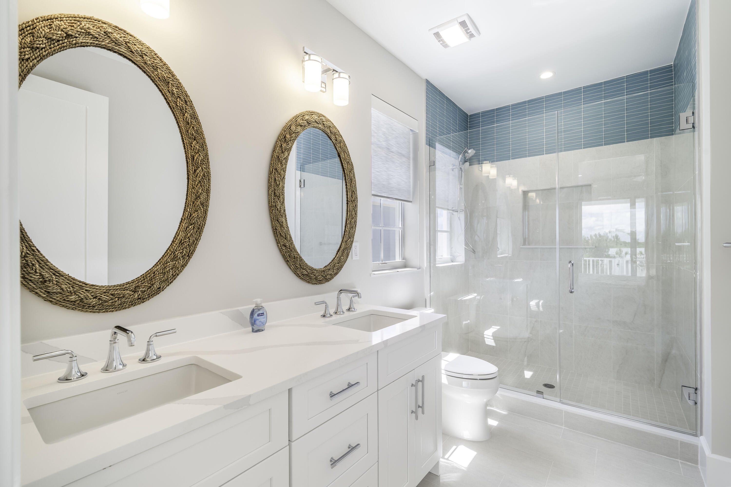 815 39th Street Marathon, FL 33050 - Photo 22 of 24 a bathroom with a double vanity sink mirror and shower