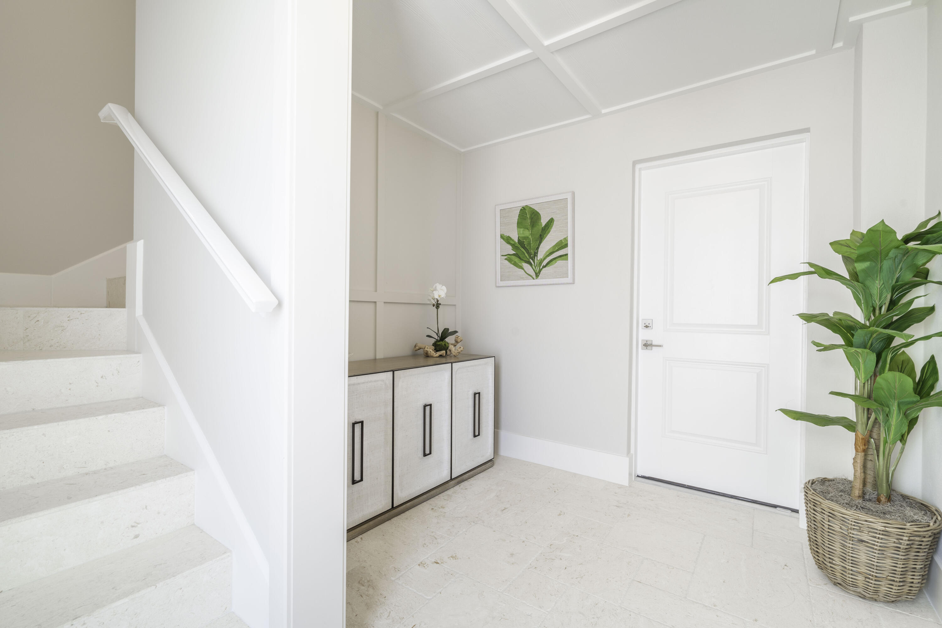 815 39th Street Marathon, FL 33050 - Photo 24 of 24 a hallway with cabinets and a potted plant