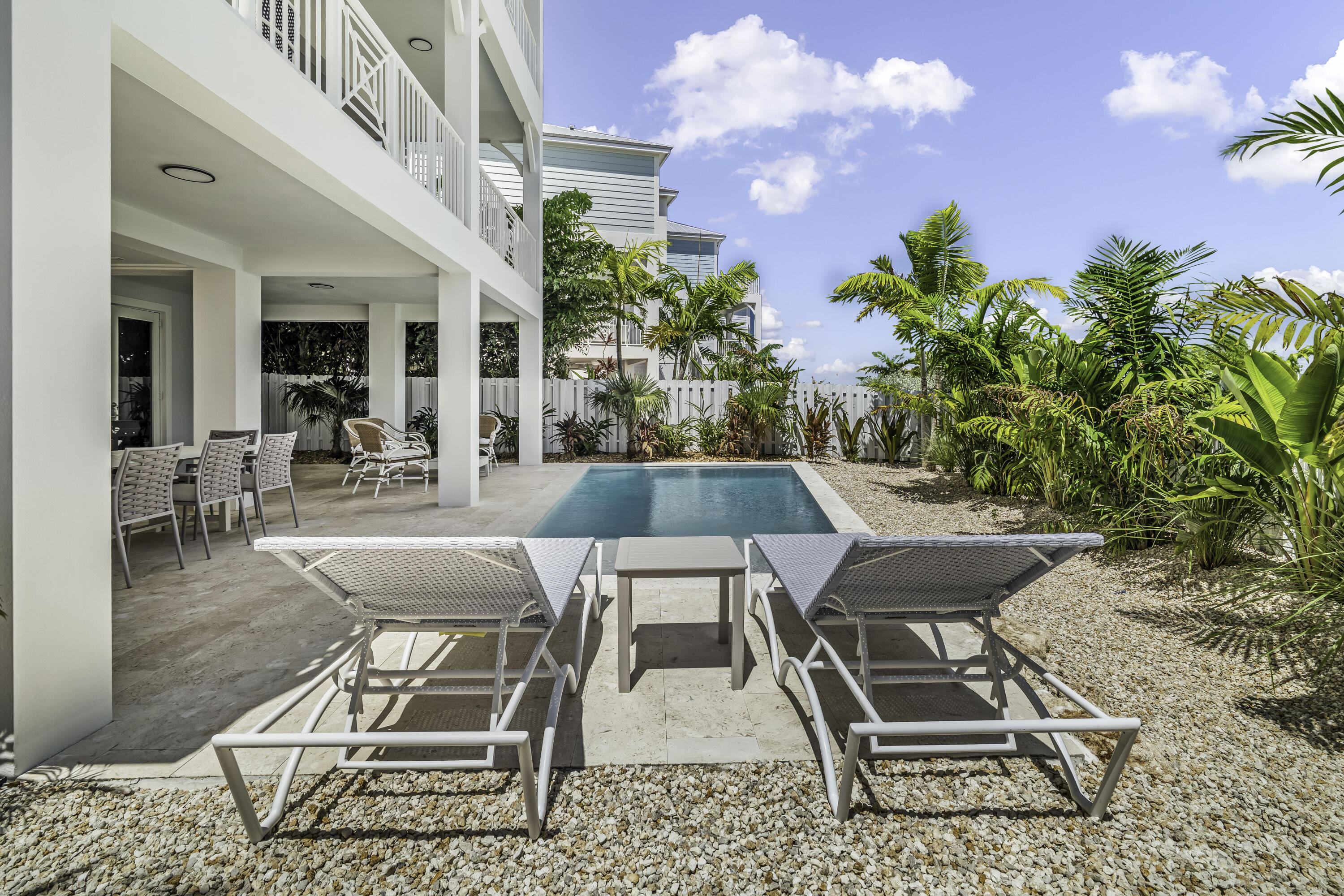 815 39th Street Marathon, FL 33050 - Photo 5 of 24 a outdoor space with patio the couches and a potted plant