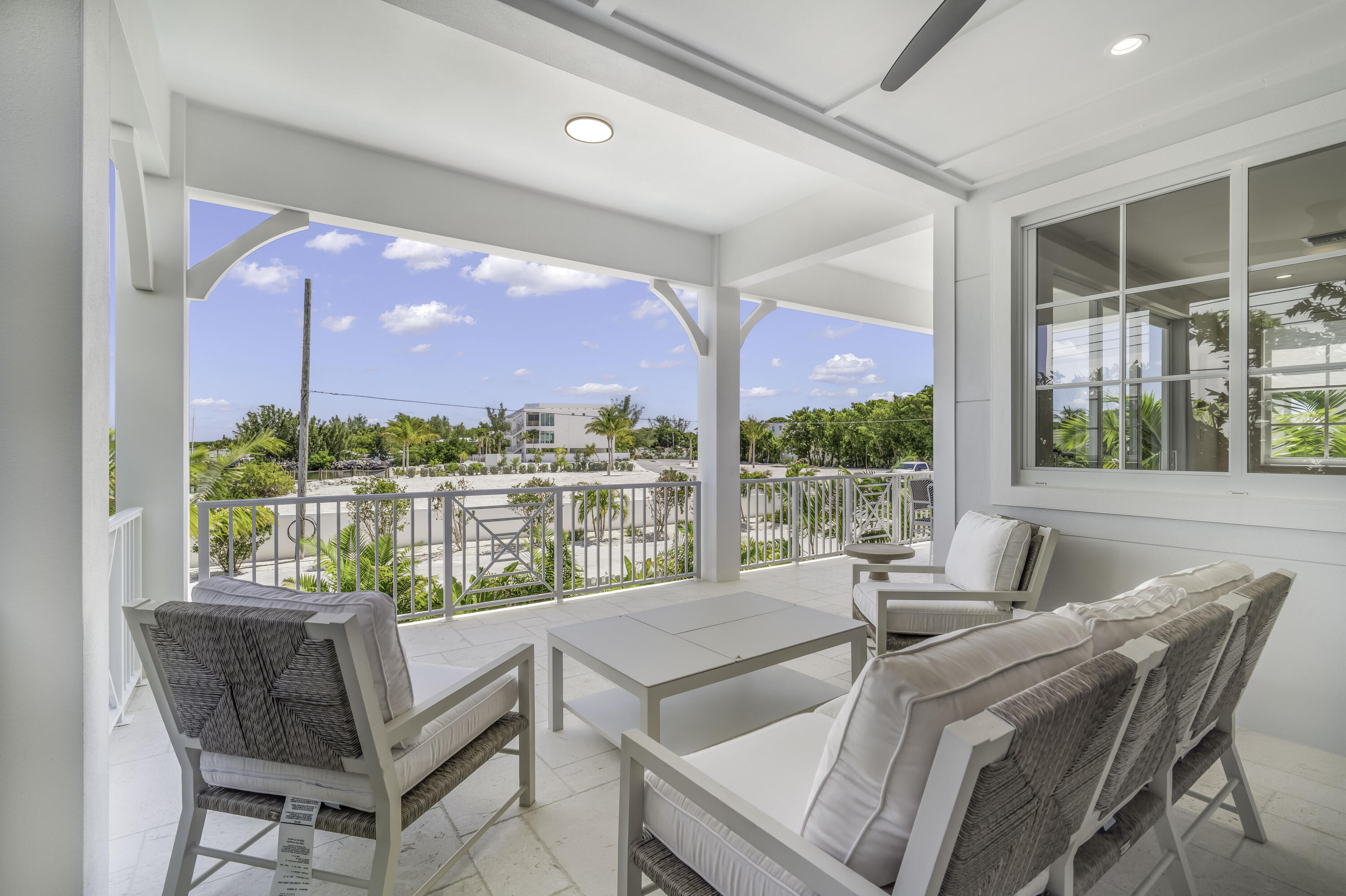 815 39th Street Marathon, FL 33050 - Photo 7 of 24 a dining room with furniture and a floor to ceiling window