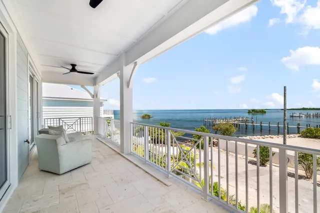 a view of balcony with furniture