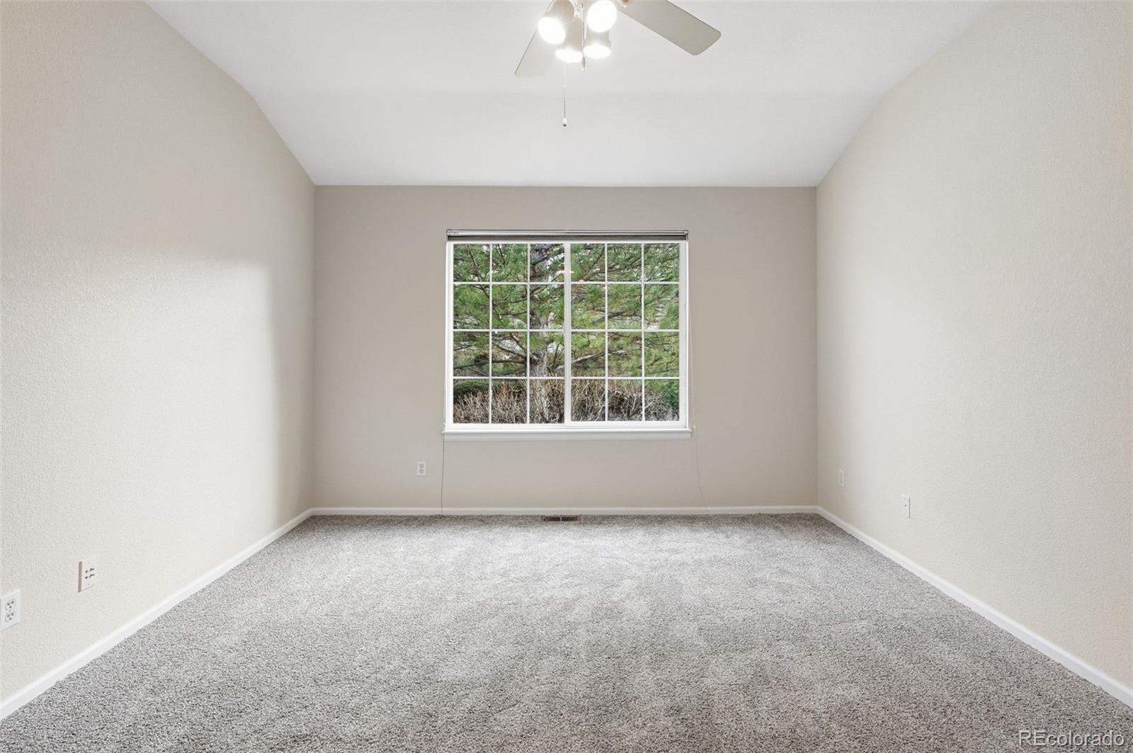 2526 South Tucson Circle Aurora, CO 80014 - Photo 21 of 33 an empty room with a window