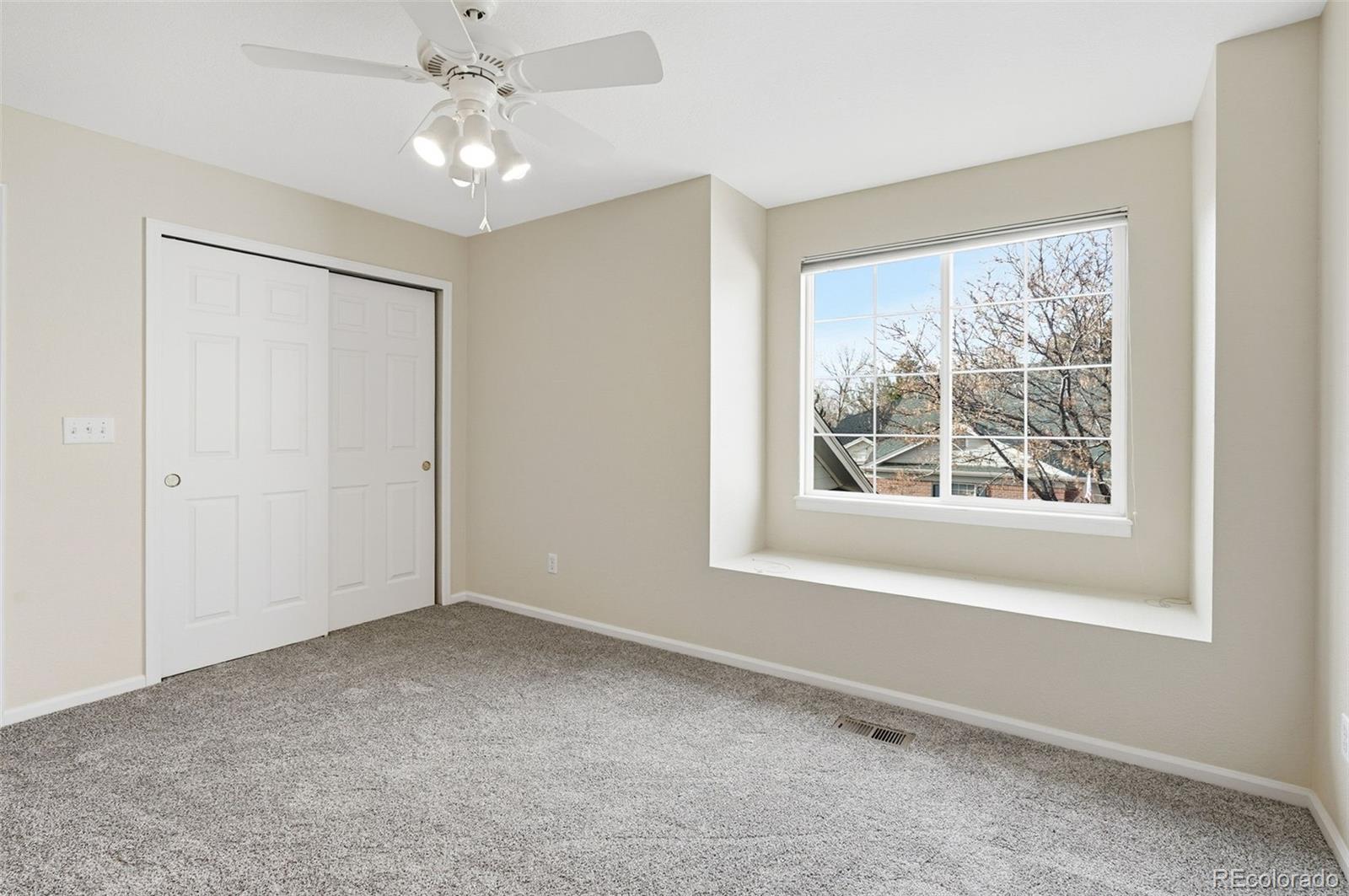 2526 South Tucson Circle Aurora, CO 80014 - Photo 26 of 33 a view of an empty room with a window