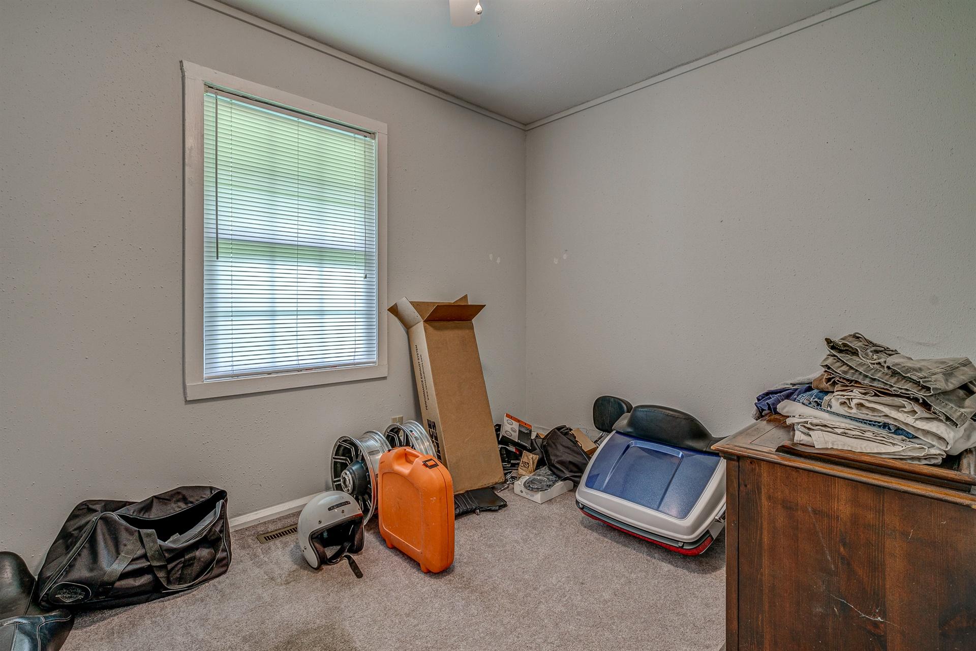 516 Jefferson Dock Road Penhook, VA 24137 - Photo 12 of 20 a view of a room with workspace and a window