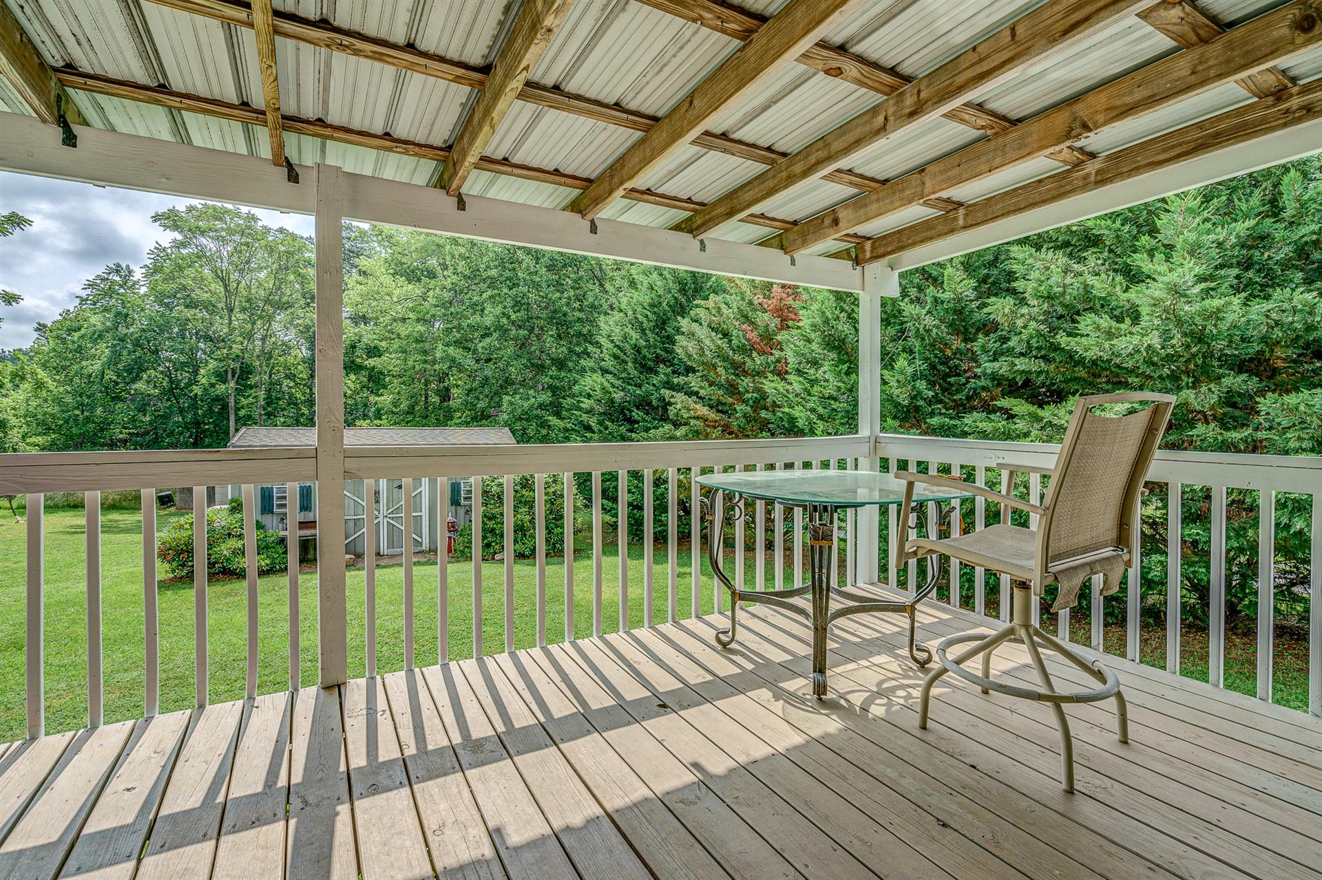 516 Jefferson Dock Road Penhook, VA 24137 - Photo 14 of 20 a view of a balcony with wooden floor