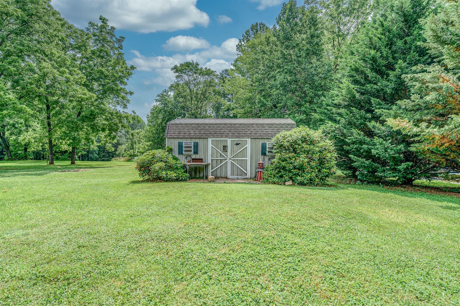 516 Jefferson Dock Road Penhook, VA 24137 - Photo 15 of 20 a view of a house with a yard