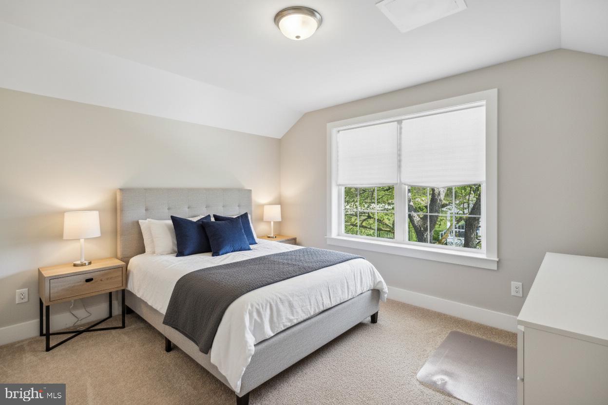 24019 Ingrams Drive Millsboro, DE 19966 - Photo 28 of 49 a bedroom with a bed and a large window