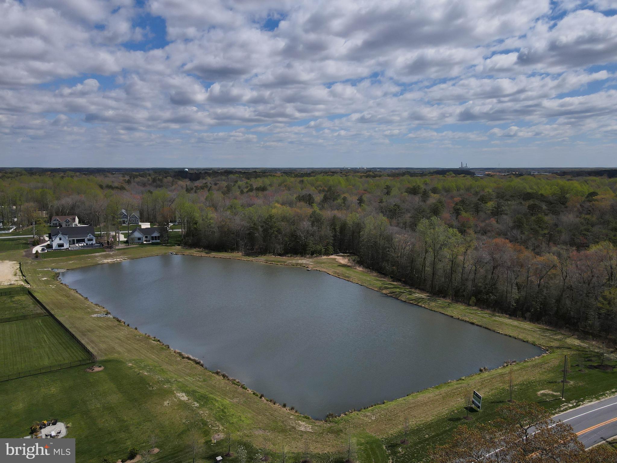 24019 Ingrams Drive Millsboro, DE 19966 - Photo 46 of 49 a view of a swimming pool with an outdoor seating