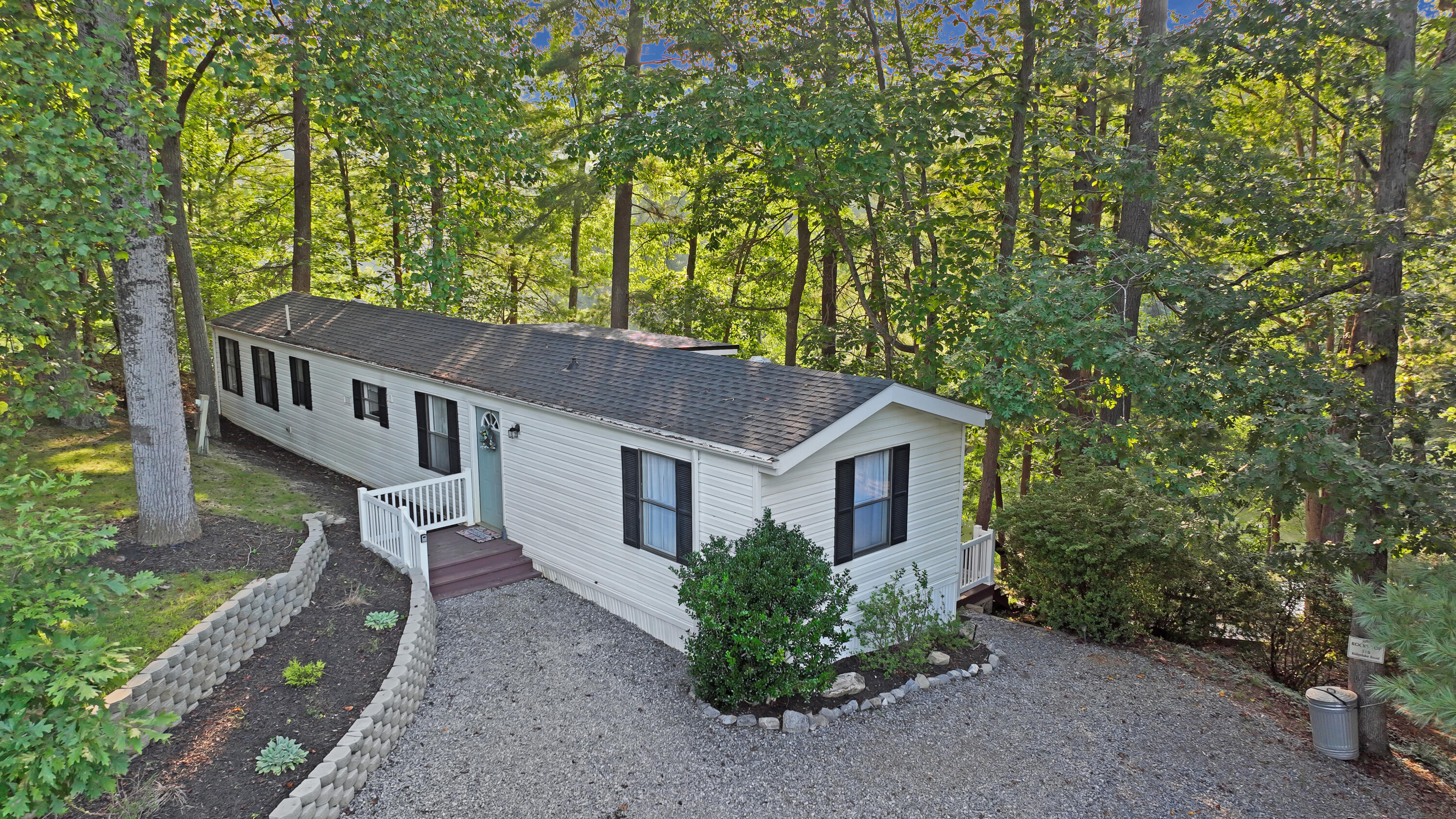 518 Ridgelake Road Goodview, VA 24095 - Photo 1 of 27 front view of a house with a garden