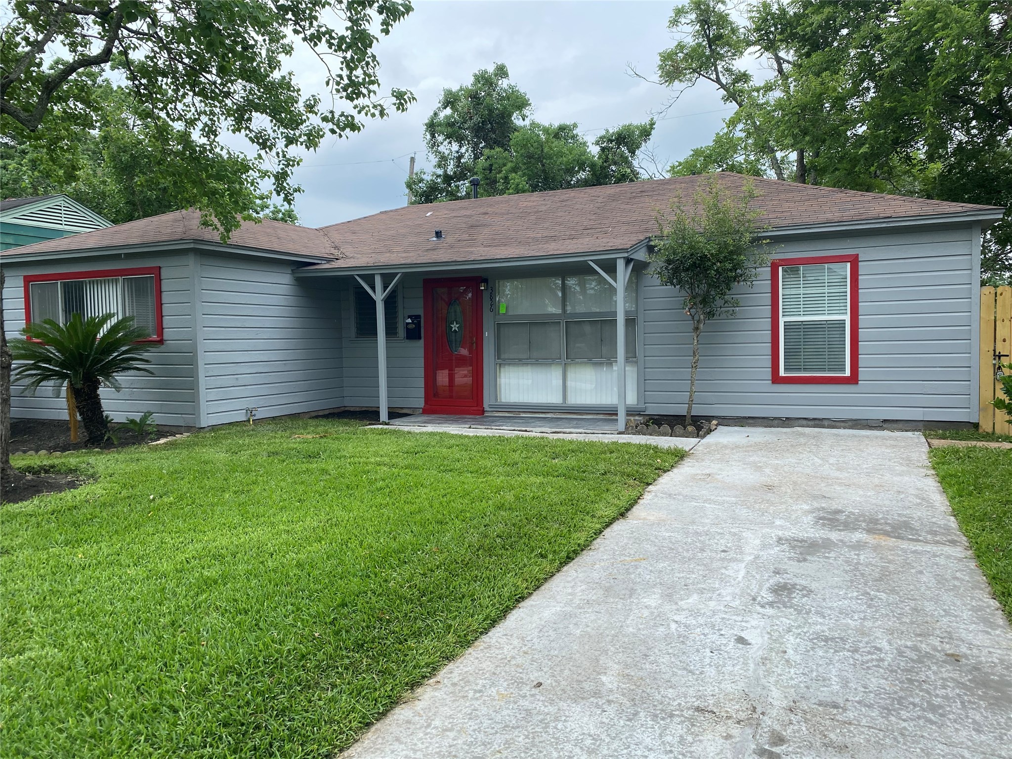 a view of a house with a garden
