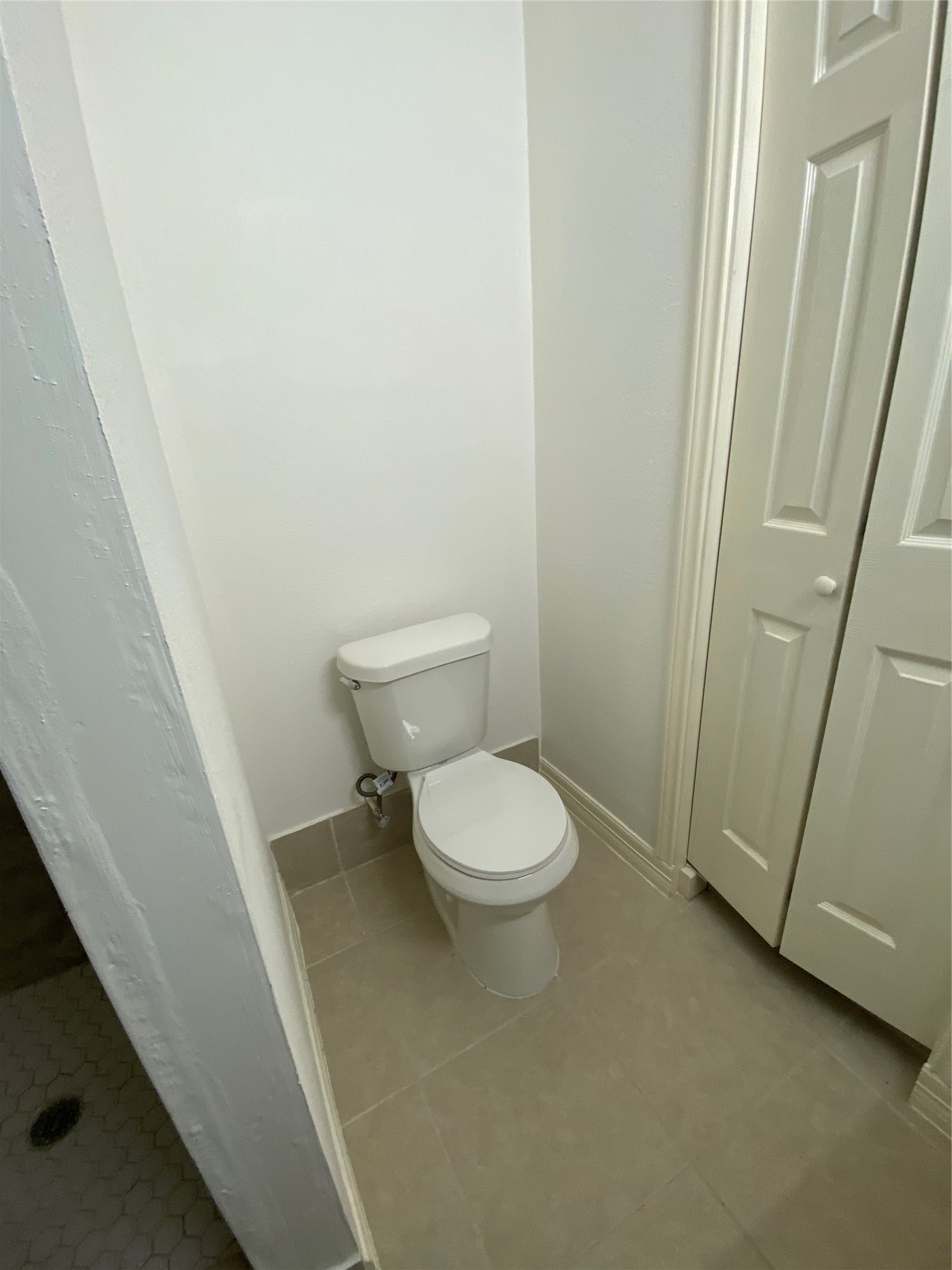 3826 Botany Lane Houston, TX 77047 - Photo 30 of 37 a white toilet sitting next to a sink