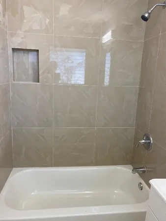 a bathroom with a bathtub
