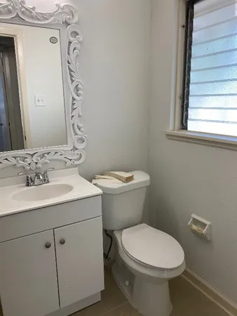 a bathroom with a sink and a toilet