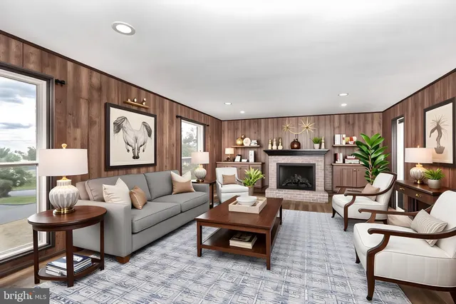 a view of a hallway with wooden floor and entryway
