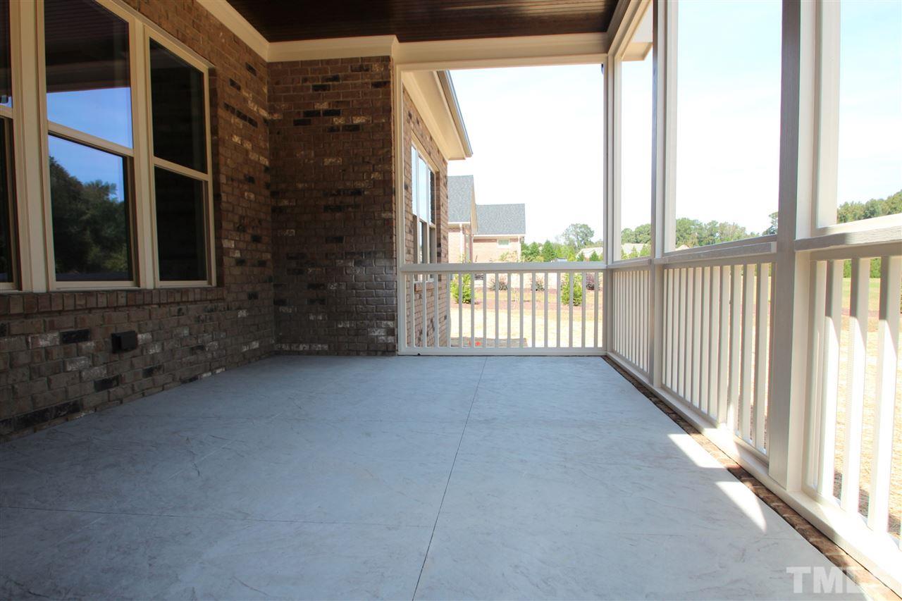 6909 Old Mills Road Fuquay-Varina, NC 27526 - Photo 25 of 25 a view of a balcony with an outdoor space