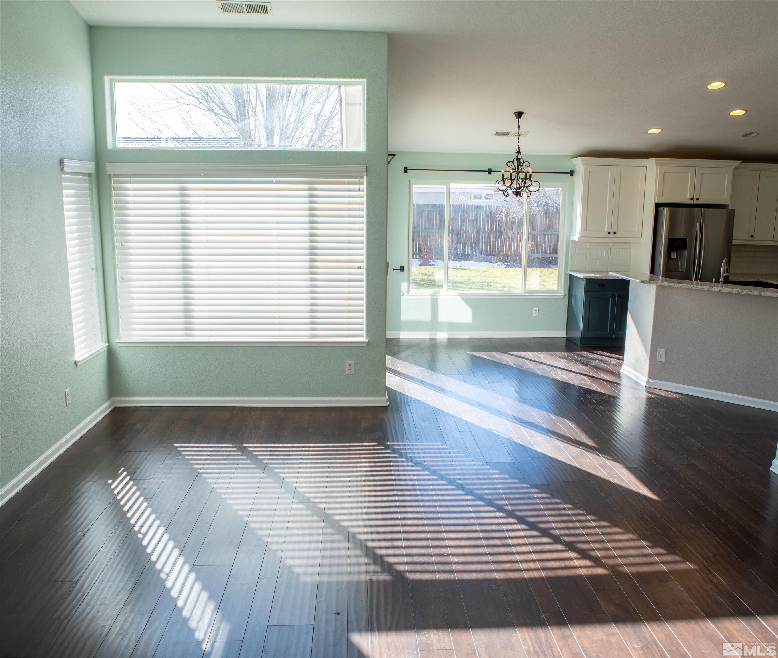 1754 River Gorge Drive Reno, NV 89521 - Photo 3 of 18 a view of a living room and a kitchen
