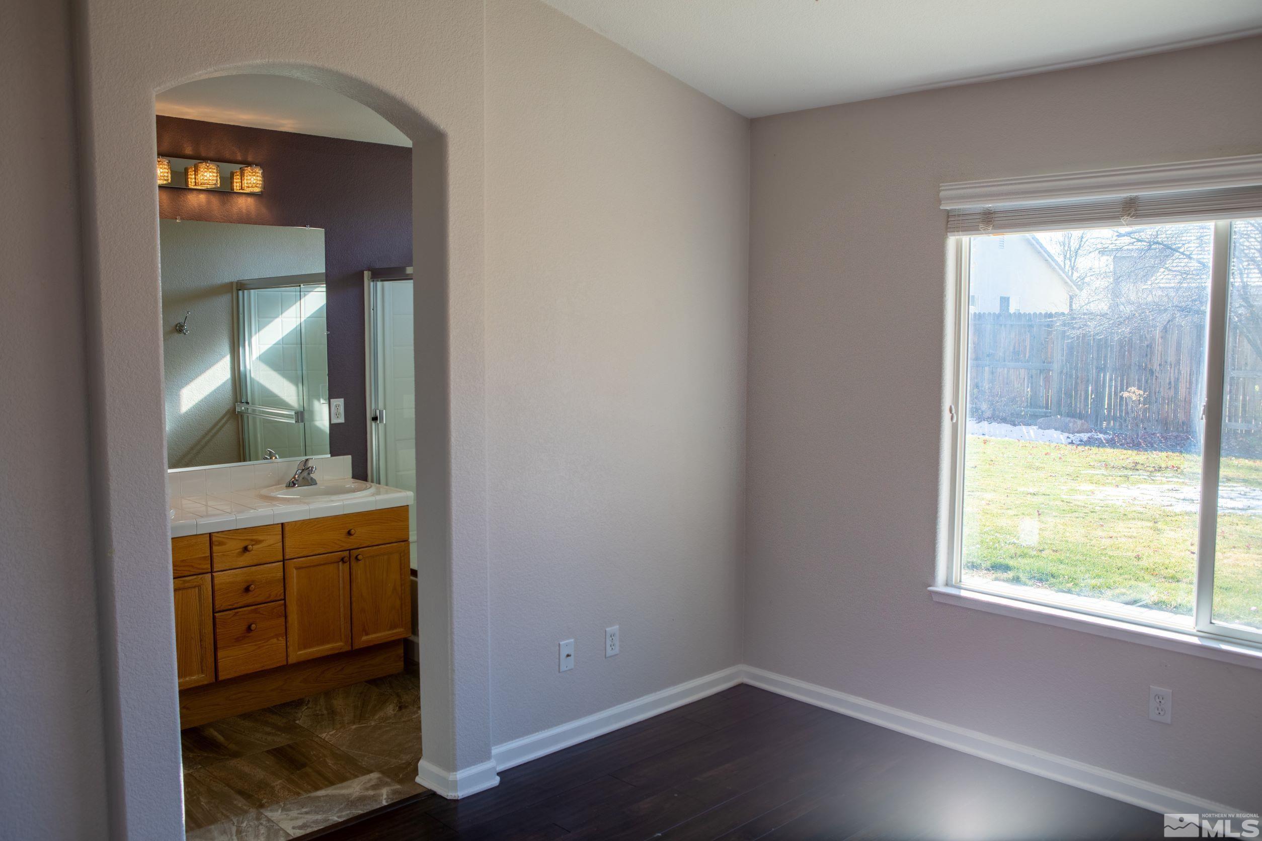 1754 River Gorge Drive Reno, NV 89521 - Photo 10 of 18 an empty room with mirror