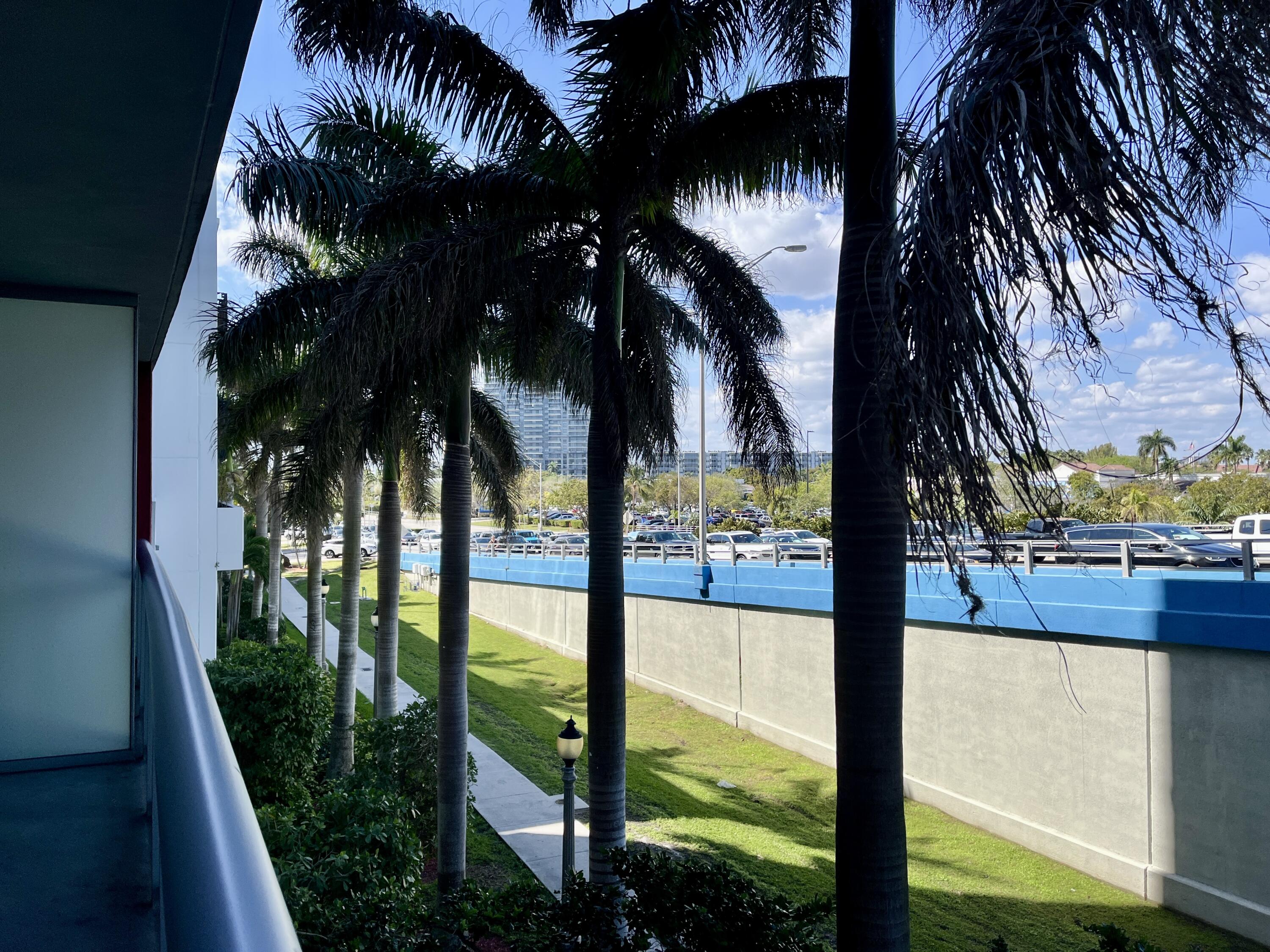 2602 East Hallandale Beach Boulevard, Unit R308 Hallandale Beach, FL 33009 - Photo 10 of 74 a view of backyard from window