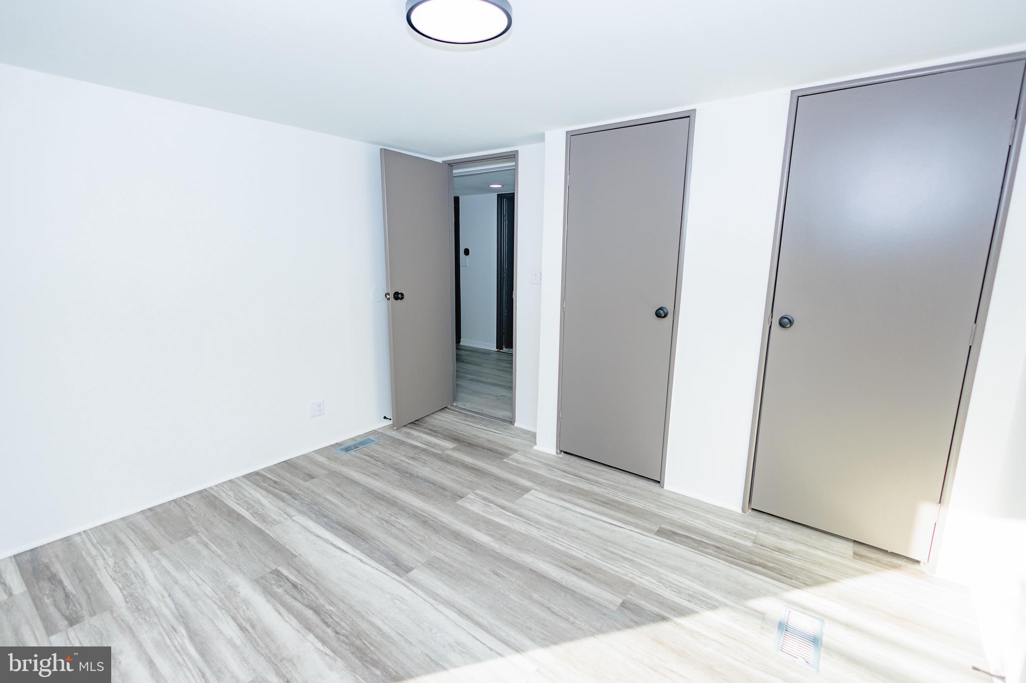 85 Hickory Avenue Mantua, NJ 08051 - Photo 15 of 28 a view of a room with wooden floor and bathroom