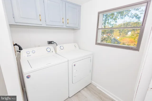 a view of a hallway with staircase