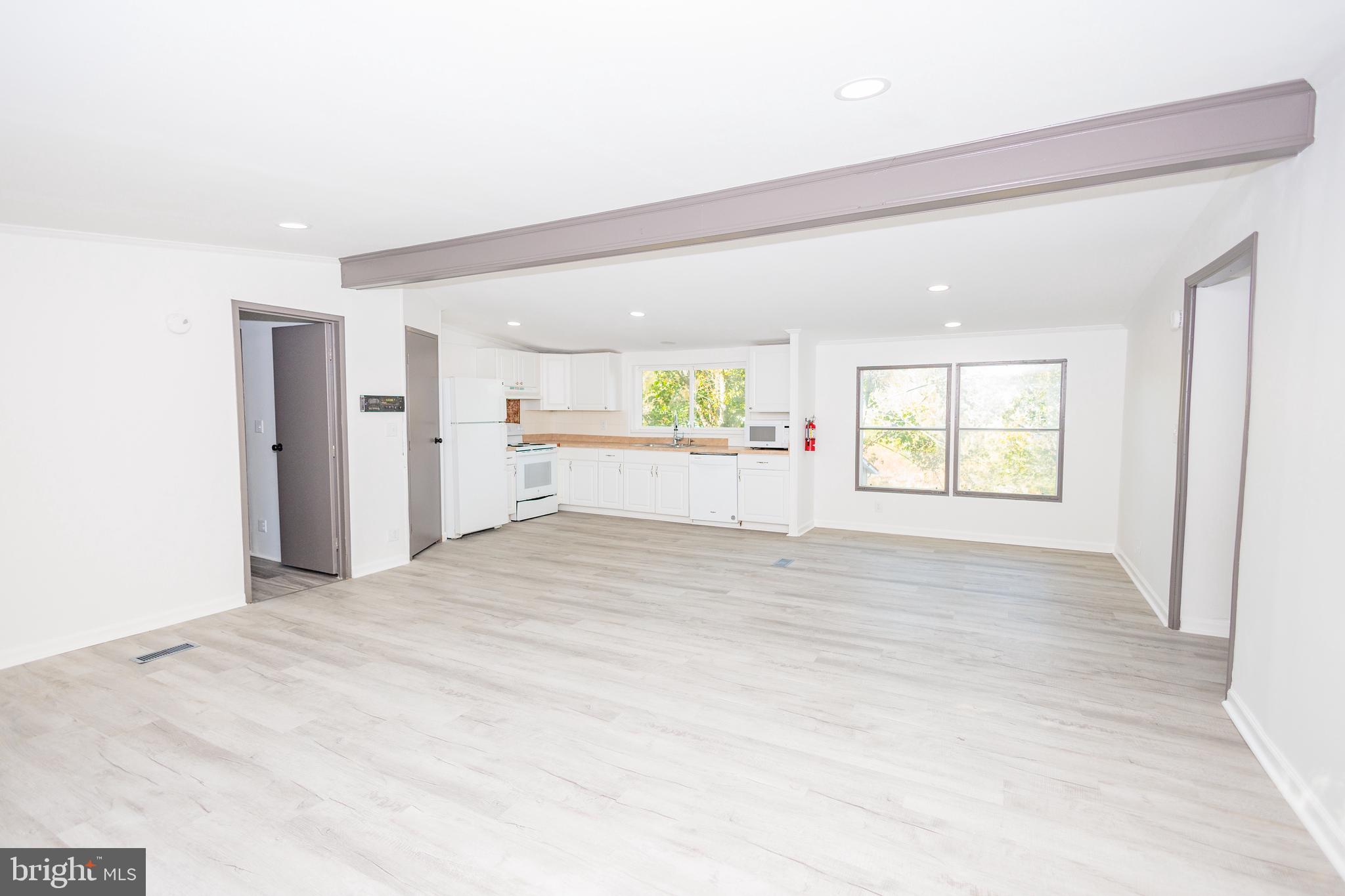 85 Hickory Avenue Mantua, NJ 08051 - Photo 3 of 28 a view of an empty room with a window