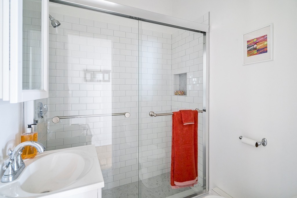 15 Trowbridge Street, Unit 3 Cambridge, MA 02138 - Photo 11 of 14 a bathroom with a tub and shower