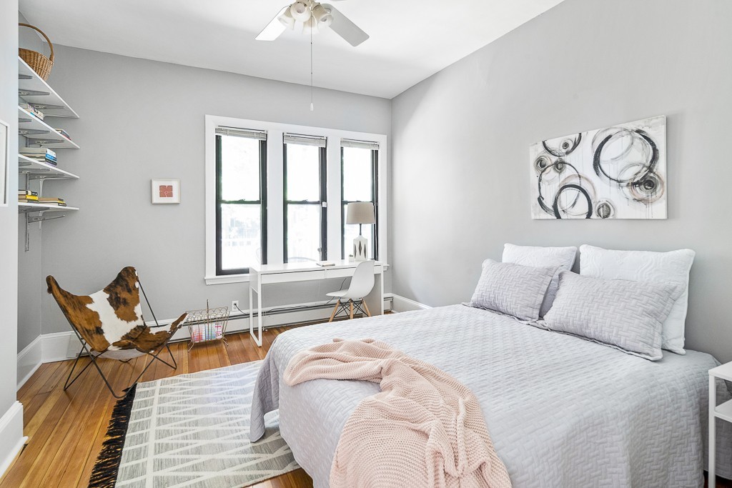 15 Trowbridge Street, Unit 3 Cambridge, MA 02138 - Photo 7 of 14 a bedroom with a bed and wooden floor