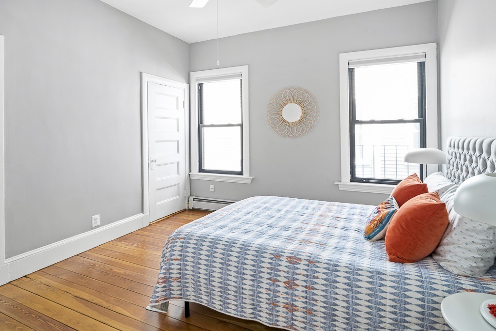 15 Trowbridge Street, Unit 3 Cambridge, MA 02138 - Photo 10 of 14 a bedroom with a bed and window