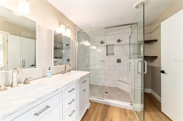 a view of a house with backyard porch and sitting area