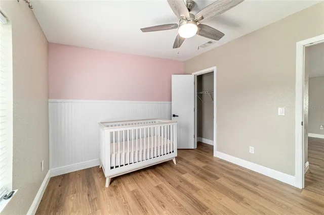 a living room with furniture and flat screen tv