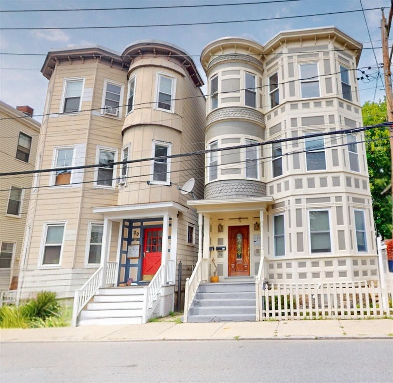 a front view of a multi story residential apartment building