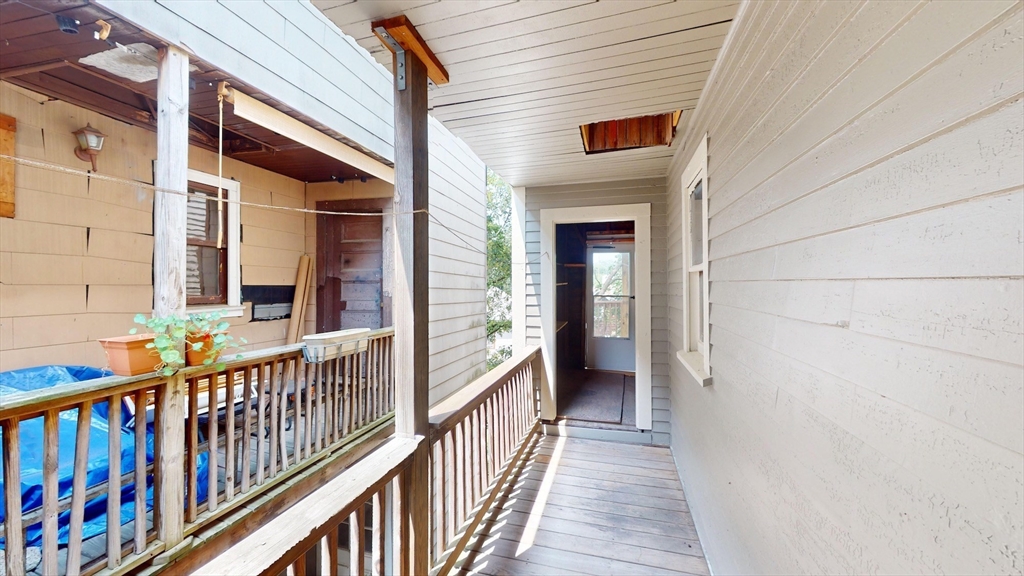 22 Boynton Street Boston, MA 02130 - Photo 32 of 34 a view of a balcony with wooden floor