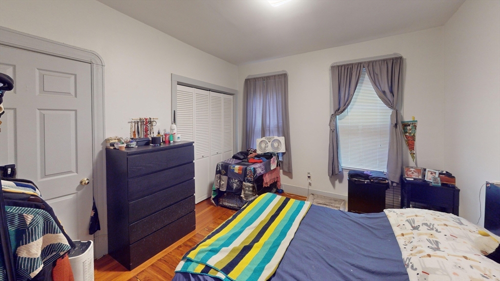 22 Boynton Street Boston, MA 02130 - Photo 10 of 34 a room with furniture and wooden floor