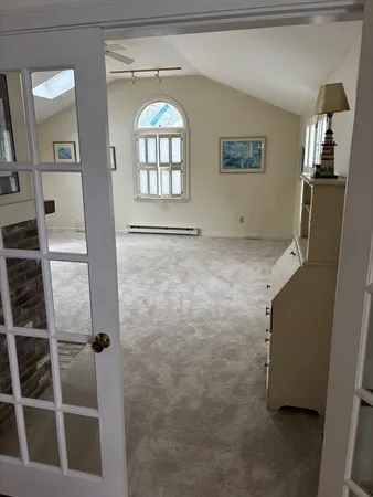 a view of livingroom with furniture and window