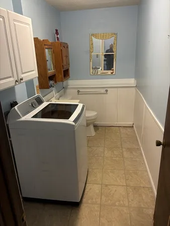 a bathroom with a sink and mirror