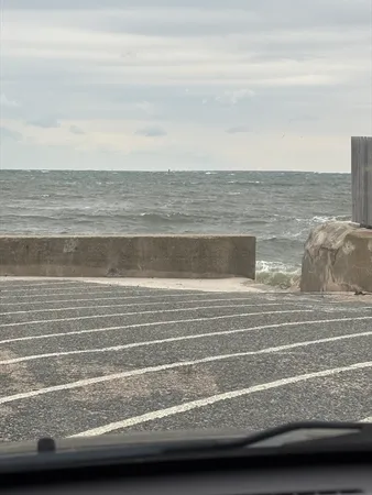 a view of ocean with beach
