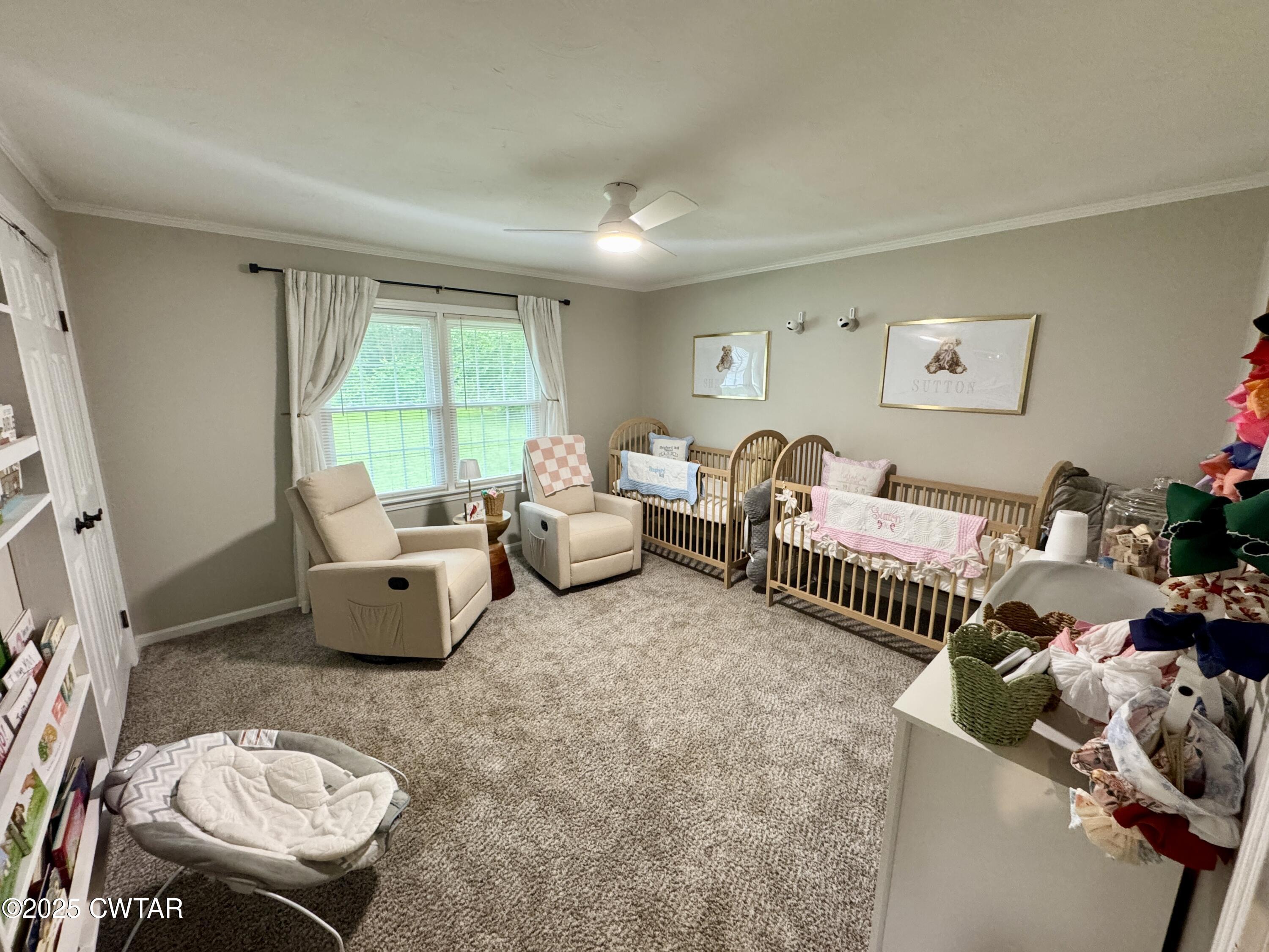302 Flora Circle Newbern, TN 38059 - Photo 17 of 20 a living room with furniture and a large window
