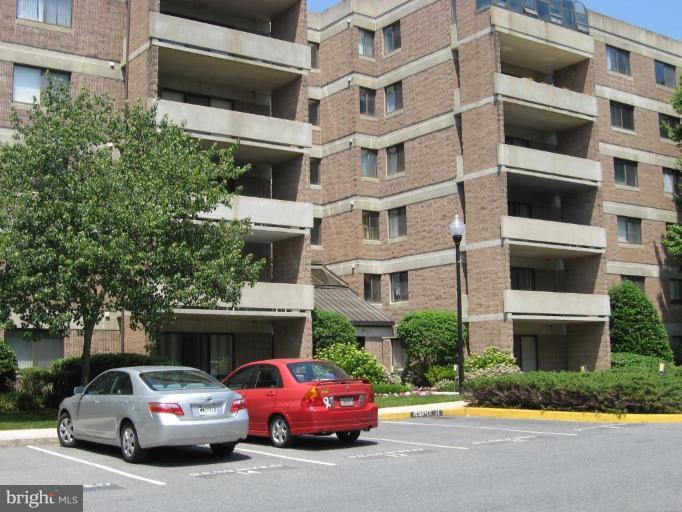 a car parked in front of a building