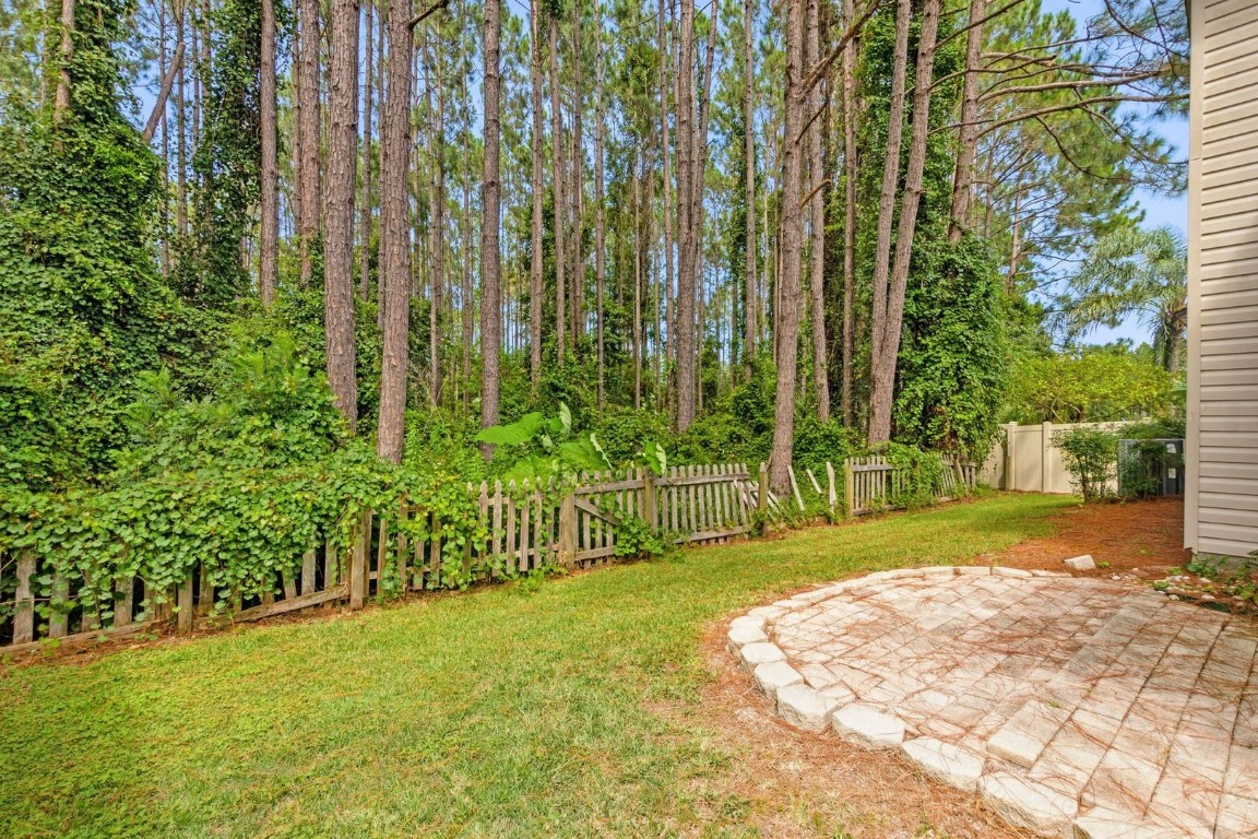 96696 Commodore Point Drive Yulee, FL 32097 - Photo 18 of 21 a view of a back yard