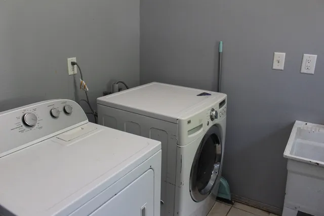a view of front door with wooden floor
