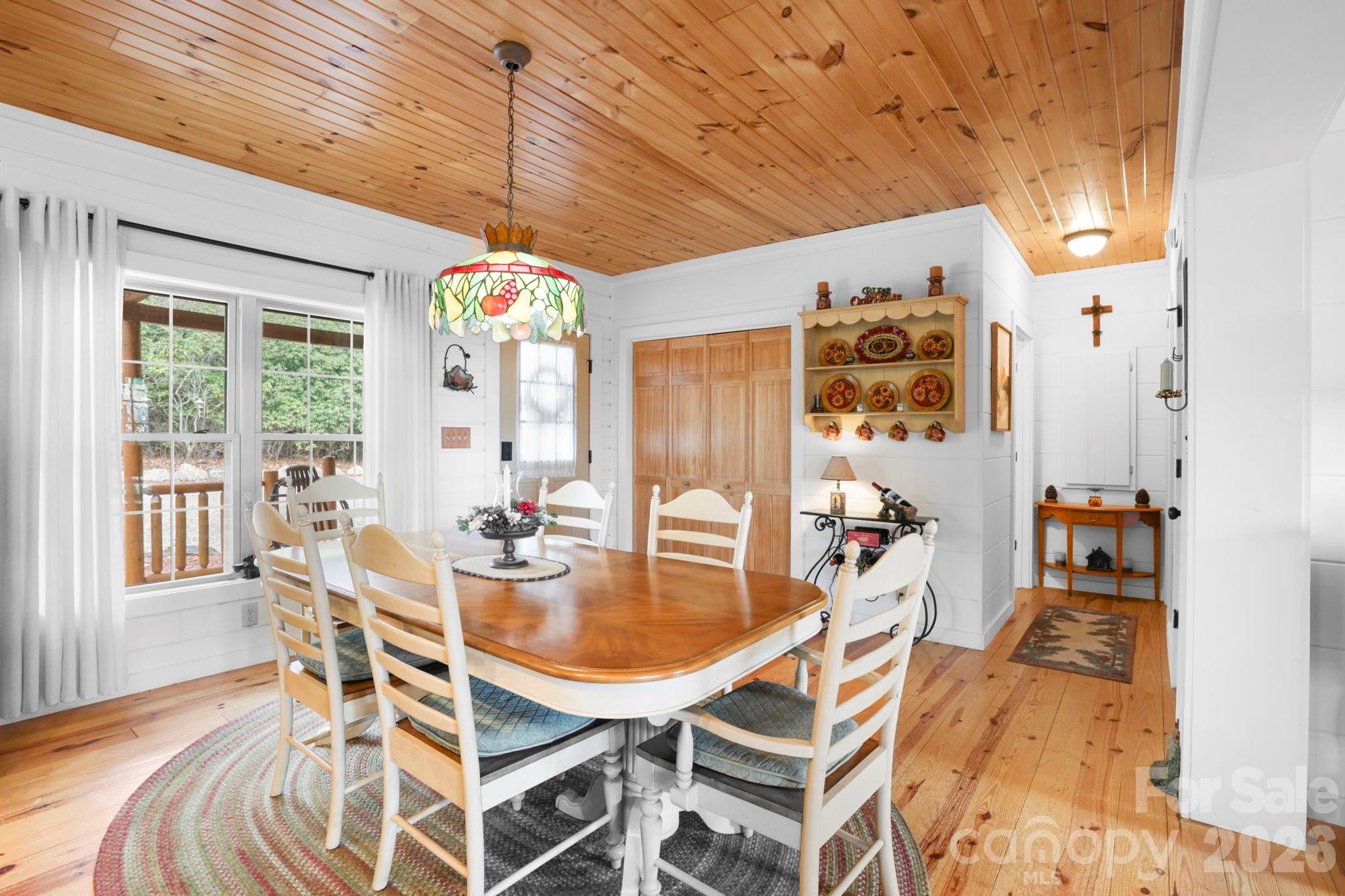 78 Longview Ridge Lake Toxaway, NC 28747 - Photo 13 of 43 a dining room with furniture and window
